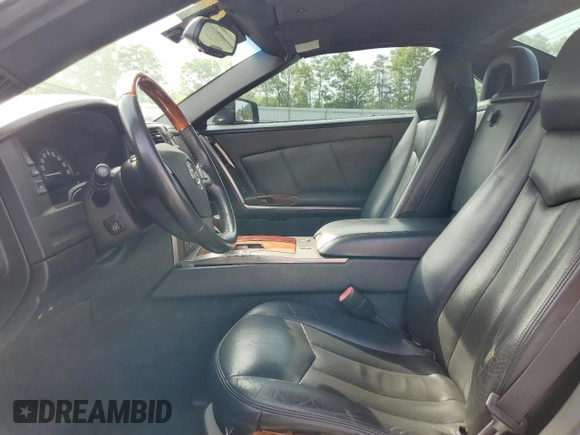 2006 Cadillac XLR z VIN 1G6YV36A265600782, wystawiony jako Copart lot #54352705 z przebiegiem 94 678 mil mil oraz Szkody całkowita. Historia ofert i sprzedaży dostępna na DreamBid. Obrazek 7.