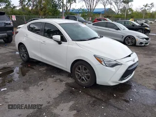 2019 Toyota Yaris Sedan L with VIN 3MYDLBYV4KY519194, listed as a IAAI auction lot 41609673 with 169,501 mi miles. Bid and sale history available at carsss.com. Image 1.