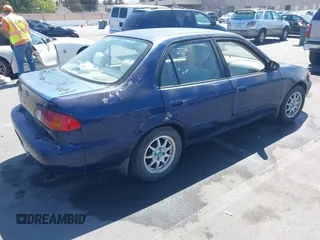 1998 Toyota Corolla VE z VIN 2T1BR18E4WC099280, wystawiony jako IAAI lot #42624278 z przebiegiem 129 901 mil mil oraz . Historia ofert i sprzedaży dostępna na DreamBid. Obrazek 4.