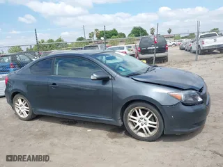 2006 Scion tC with VIN JTKDE177260081483, listed as a IAAI auction lot 42076072 with 156,556 mi miles. Bid and sale history available at carsss.com. Image 14.