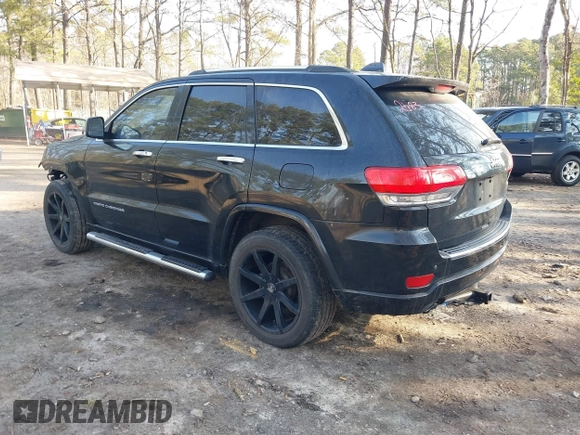 2015 Jeep Grand Cherokee Overland with VIN 1C4RJECGXFC957530, listed as a IAAI auction lot 41633522 with 168,258 mi miles and . Bid and sale history available at DreamBid. Image 3.