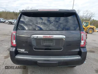 2017 GMC Yukon Denali with VIN 1GKS1CKJ0HR153941, listed as a IAAI auction lot 41300648 with 128,193 mi miles. Bid and sale history available at carsss.com. Image 16.