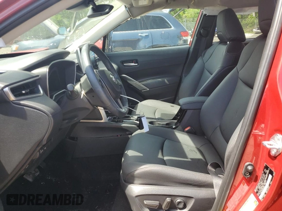 2022 Toyota Corolla Cross XLE with VIN 7MUDAABG5NV005882, listed as a Copart auction lot 56690265 with 6,427 mi miles and Salvage title. Bid and sale history available at DreamBid. Image 7.