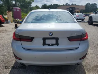 2020 BMW 3 Series 330i with VIN WBA5R1C07LFH40014, listed as a Copart auction lot 60656645 with 76,392 mi miles and Clean title. Bid and sale history available at DreamBid. Image 6.