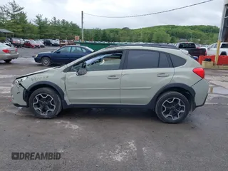 2014 Subaru Crosstrek Limited z VIN JF2GPAKC6E8267340, wystawiony jako IAAI lot #42216351 z przebiegiem 98 590 mil mil oraz . Historia ofert i sprzedaży dostępna na DreamBid. Obrazek 14.