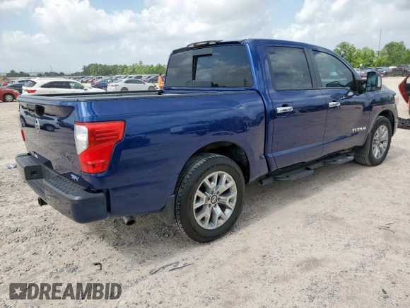 2021 Nissan Titan SV with VIN 1N6AA1EF0MN512559, listed as a Copart auction lot 61561305 with 31,344 mi miles and Salvage title. Bid and sale history available at DreamBid. Image 3.