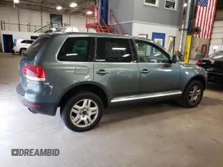 2004 Volkswagen Touareg z VIN WVGCM67L94D032492, wystawiony jako Copart lot #72205044 z przebiegiem 98 482 mil mil oraz Tytuł czysty. Historia ofert i sprzedaży dostępna na DreamBid. Obrazek 3.