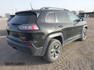2019 Jeep Cherokee Trailhawk Elite with VIN 1C4PJMBX4KD385796, listed as a IAAI auction lot 41557577 with 55,700 mi miles. Bid and sale history available at carsss.com. Image 4.
