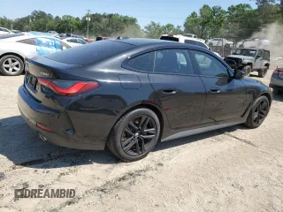 2023 BMW 4 Series 430i xDrive with VIN WBA73AV01PFN88144, listed as a Copart auction lot 53514735 with 61,582 mi miles and Salvage title. Bid and sale history available at DreamBid. Image 3.