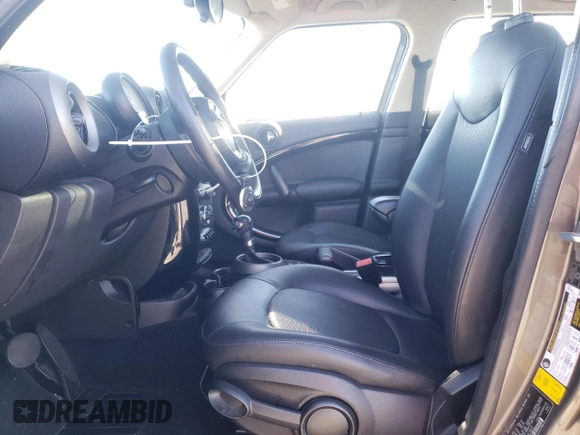 2012 MINI Countryman with VIN WMWZB3C58CWM03815, listed as a Copart auction lot 50097405 with 84,137 mi miles and Salvage Title. Bid and sale history available at DreamBid. Image 7.