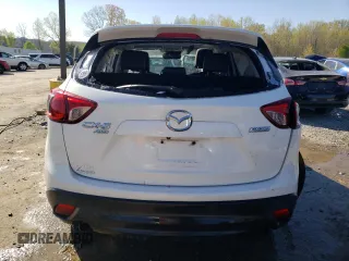 2014 Mazda CX-5 Grand Touring with VIN JM3KE4DY6E0376413, listed as a Copart auction lot 53204935 with 126,791 mi miles and Salvage Title. Bid and sale history available at DreamBid. Image 6.