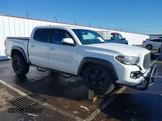 2016 Toyota Tacoma SR with VIN 5TFCZ5AN9GX020386, listed as a IAAI auction lot 41436489 with 140,512 mi miles. Bid and sale history available at carsss.com. Image 1.