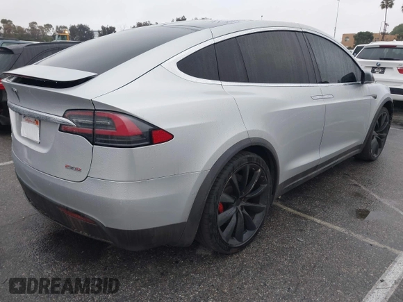 2016 Tesla Model X P90D with VIN 5YJXCBE41GF006284, listed as a IAAI auction lot 41809683 with 71,135 mi miles. Bid and sale history available at carsss.com. Image 4.