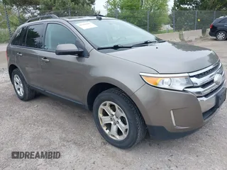 2014 Ford Edge SEL z VIN 2FMDK4JC1EBA03356, wystawiony jako IAAI lot #42304387 z przebiegiem 229 763 mil mil oraz . Historia ofert i sprzedaży dostępna na DreamBid. Obrazek 1.