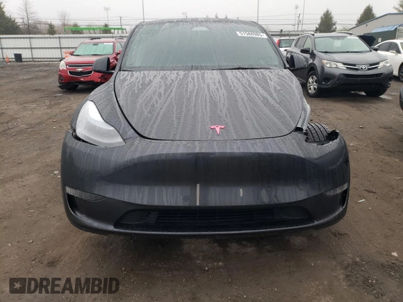 2025 Tesla Model Y Long Range z VIN 7SAYGDED9SF269767, wystawiony jako Copart lot #51588985 z przebiegiem 1 943 mil mil oraz Szkoda całkowita • Salvage title. Historia ofert i sprzedaży dostępna na DreamBid. Obrazek 5.