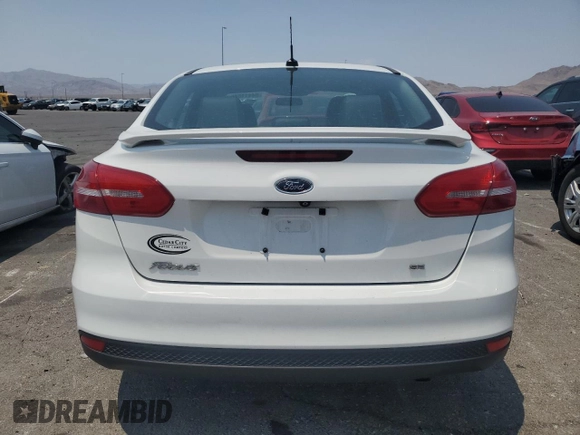 2015 Ford Focus SE with VIN 1FADP3F23FL319168, listed as a Copart auction lot 64411645 with 213,852 mi miles and Clean title. Bid and sale history available at DreamBid. Image 6.