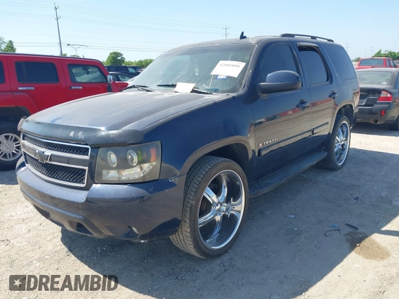 2007 Chevrolet Tahoe LTZ with VIN 1GNFC13017R285839, listed as a IAAI auction lot 42002091 with 210,039 mi miles and . Bid and sale history available at DreamBid. Image 2.