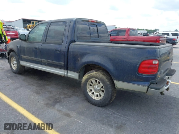 2003 Ford F-150 XLT with VIN 1FTRW076X3KC61967, listed as a IAAI auction lot 42016065 with 206,256 mi miles. Bid and sale history available at carsss.com. Image 3.