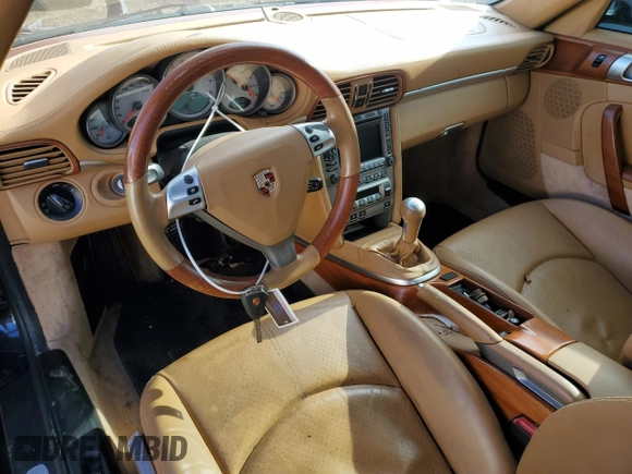 2006 Porsche 911 Carrera S with VIN WP0CB29946S765147, listed as a Copart auction lot 77937354 with 35,028 mi miles and Salvage Title. Bid and sale history available at carsss.com. Image 8.