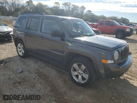 2015 Jeep Patriot Latitude with VIN 1C4NJPFBXFD281214, listed as a Copart auction lot 87883615 with 106,402 mi miles and Salvage Title. Bid and sale history available at DreamBid. Image 4.
