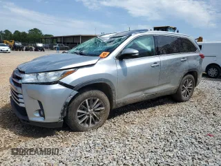2019 Toyota Highlander SE with VIN 5TDKZRFH7KS559853, listed as a Copart auction lot 57116675 with 122,587 mi miles and Salvage title. Bid and sale history available at DreamBid. Image 1.