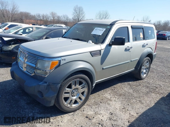 2008 Dodge Nitro SXT with VIN 1D8GU28K68W271921, listed as a IAAI auction lot 41772124 with 233,078 mi miles. Bid and sale history available at carsss.com. Image 2.