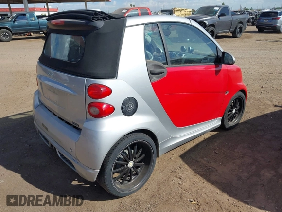 2009 Smart fortwo Passion with VIN WMEEK31X99K294322, listed as a IAAI auction lot 42014658 with Not Provided miles. Bid and sale history available at carsss.com. Image 4.