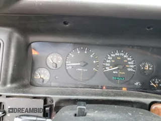 1996 Jeep Grand Cherokee Laredo with VIN 1J4GZ58S3TC297818, listed as a Copart auction lot 67712584 with 284,653 mi miles and Salvage Title. Bid and sale history available at carsss.com. Image 9.