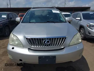 2008 Lexus RX with VIN 2T2HK31U58C053306, listed as a IAAI auction lot 42066973 with 184,266 mi miles. Bid and sale history available at carsss.com. Image 12.