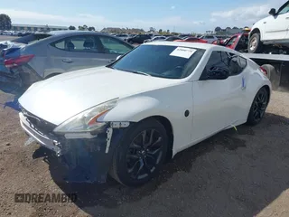 2016 Nissan 370Z Sport z VIN JN1AZ4EH9GM931683, wystawiony jako IAAI lot #42000779 z przebiegiem 113 919 mil mil oraz . Historia ofert i sprzedaży dostępna na DreamBid. Obrazek 17.