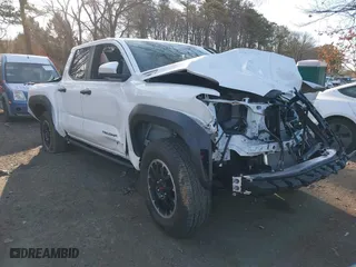 2024 Toyota Tacoma 4WD TRD Sport Hybrid with VIN 3TYLC5LN2RT003005, listed as a IAAI auction lot 41742427 with 1 mi miles. Bid and sale history available at carsss.com. Image 1.