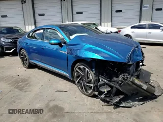 2023 Volkswagen Arteon SEL Premium R-Line z VIN WVWTR7AN8PE002467, wystawiony jako Copart lot #72014284 z przebiegiem Nie podano mil oraz Szkoda całkowita • Salvage title. Historia ofert i sprzedaży dostępna na DreamBid. Obrazek 11.