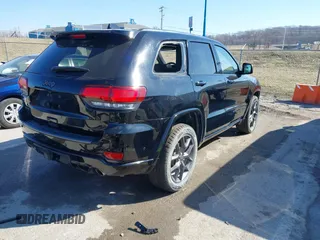 2021 Jeep Grand Cherokee 80th Anniversary with VIN 1C4RJFBG9MC745643, listed as a IAAI auction lot 41729989 with 88,567 mi miles and . Bid and sale history available at DreamBid. Image 4.