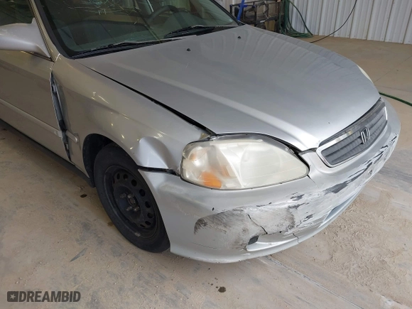 1999 Honda Civic EX with VIN 1HGEJ8640XL013417, listed as a IAAI auction lot 41915827 with 257,696 mi miles. Bid and sale history available at carsss.com. Image 6.