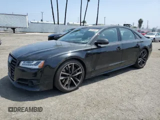 2017 Audi S8 z VIN WUAJ5AFD1HN900459, wystawiony jako Copart lot #56844604 z przebiegiem 59 941 mil mil oraz Szkody całkowita. Historia ofert i sprzedaży dostępna na DreamBid. Obrazek 1.