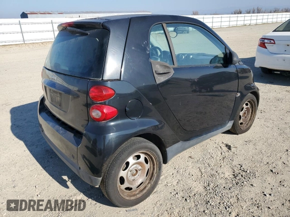 2012 Smart fortwo Pure z VIN WMEEJ3BA4CK572144, wystawiony jako Copart lot #42556025 z przebiegiem 99 007 mil mil oraz Tytuł czysty. Historia ofert i sprzedaży dostępna na DreamBid. Obrazek 3.