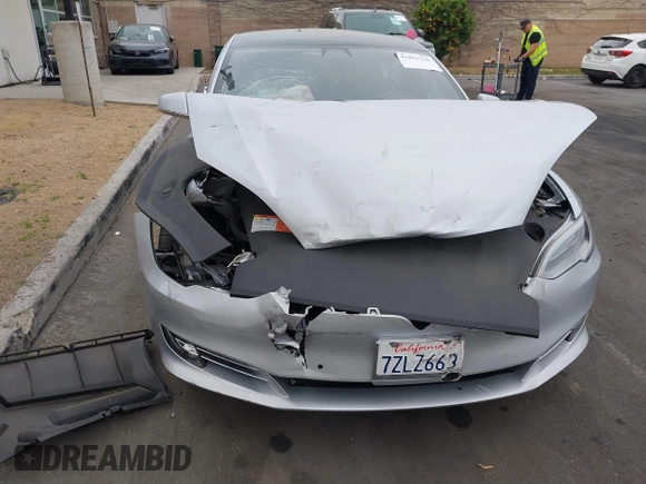 2017 Tesla Model S 60 with VIN 5YJSA1E17HF189627, listed as a IAAI auction lot 41891766 with 106,003 mi miles and . Bid and sale history available at DreamBid. Image 6.