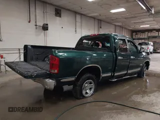 2002 Dodge 1500 with VIN 3B7HA18N02G113497, listed as a IAAI auction lot 39911524 with 127,262 mi miles and . Bid and sale history available at DreamBid. Image 4.