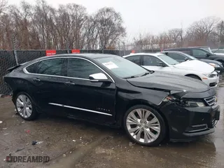 2014 Chevrolet Impala LTZ with VIN 1G1155S34EU164127, listed as a IAAI auction lot 41697650 with 1 mi miles. Bid and sale history available at carsss.com. Image 13.