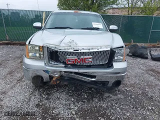 2013 GMC Sierra 1500 SLT with VIN 3GTP2WE74DG224066, listed as a IAAI auction lot 41990545 with 169,296 mi miles. Bid and sale history available at carsss.com. Image 6.