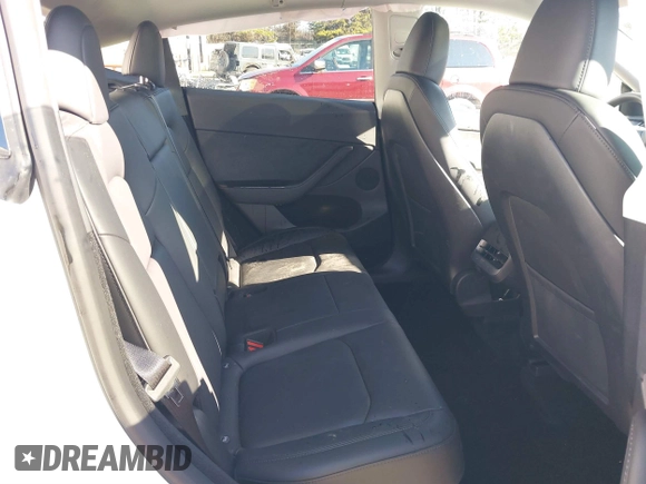 2023 Tesla Model Y Performance with VIN 7SAYGDEF3PF711497, listed as a IAAI auction lot 41877450 with 21,887 mi miles and . Bid and sale history available at DreamBid. Image 8.