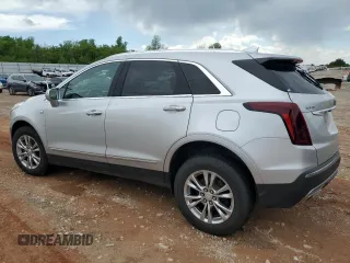 2020 Cadillac XT5 Premium Luxury FWD z VIN 1GYKNCRS1LZ191485, wystawiony jako Copart lot #54657525 z przebiegiem Nie podano mil oraz Szkoda całkowita • Salvage title. Historia ofert i sprzedaży dostępna na DreamBid. Obrazek 2.