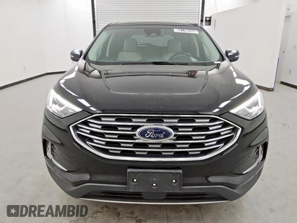 2021 Ford Edge Titanium с VIN 2FMPK4K94MBA27083, выставлен на аукционе Copart как лот 62149285 с пробегом 128 325 миль миль и Чистый • Clean title. История ставок и продаж доступна на DreamBid. Изображение 5.