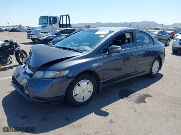 2008 Honda Civic Hybrid with VIN JHMFA36258S021538, listed as a IAAI auction lot 41857565 with 179,441 mi miles. Bid and sale history available at carsss.com. Image 2.