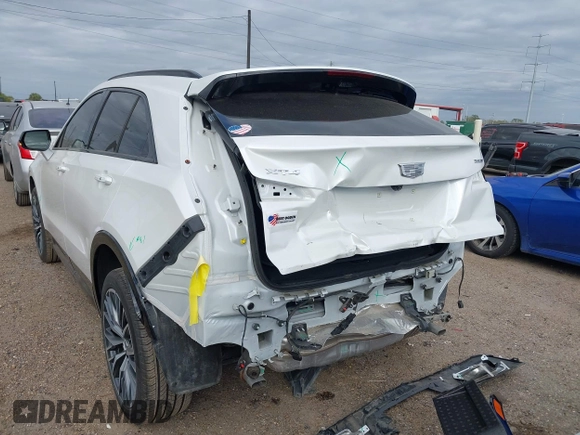 2024 Cadillac XT4 FWD Sport with VIN 1GYFZER48RF180481, listed as a IAAI auction lot 41093587 with 3,982 mi miles and . Bid and sale history available at DreamBid. Image 3.