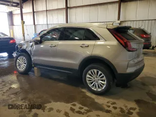 2024 Cadillac XT4 AWD Luxury with VIN 1GYFZBR48RF242850, listed as a Copart auction lot 52290865 with 1,524 mi miles and Salvage Title. Bid and sale history available at carsss.com. Image 2.