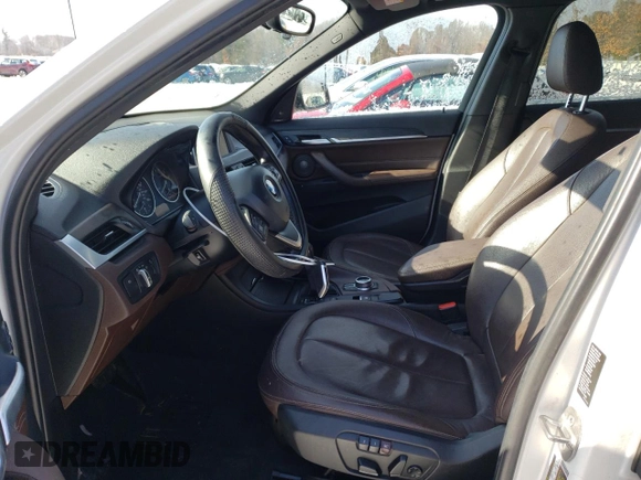 2017 BMW X1 xDrive28i with VIN WBXHT3C33H5F77000, listed as a Copart auction lot 41860993 with 113,553 mi miles. Bid and sale history available at carsss.com. Image 7.