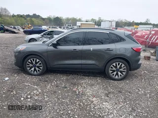 2020 Ford Escape SE Sport Hybrid with VIN 1FMCU0BZ7LUB13398, listed as a IAAI auction lot 41942498 with 118,604 mi miles and . Bid and sale history available at DreamBid. Image 15.