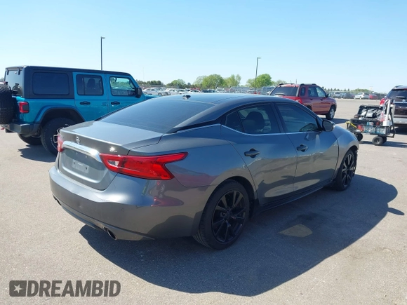 2018 Nissan Maxima SL with VIN 1N4AA6AP9JC360485, listed as a IAAI auction lot 42206521 with 140,898 mi miles and . Bid and sale history available at DreamBid. Image 4.