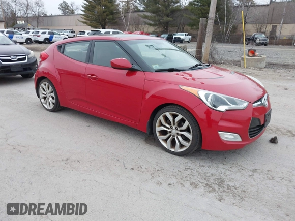 2012 Hyundai Veloster w/Black Int with VIN KMHTC6AD7CU072850, listed as a IAAI auction lot 41868715 with 141,792 mi miles and . Bid and sale history available at DreamBid. Image 1.